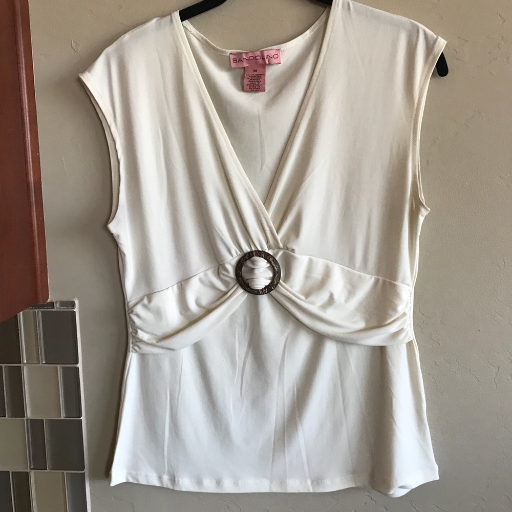 Bandolino Top with a brown embellishment at waist.